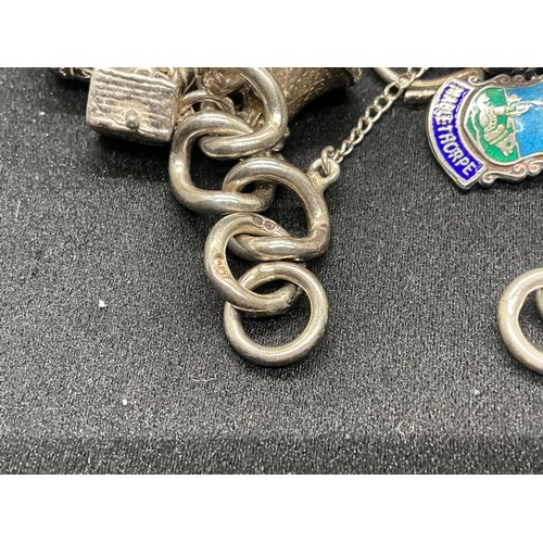 20 - HALLMARKED SILVER CHARM BRACELET WITH 28 SILVER CHARMS W71.9G WITH 3 ADDITIONAL NON SILVER CHARMS - ... 