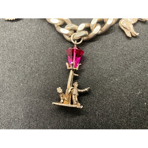 22 - HALLMARKED SILVER CHARM BRACELET WITH 6 SILVER CHARMS W54G - SAFETY CHAIN IS NOT SILVER, LOCKET & CH... 