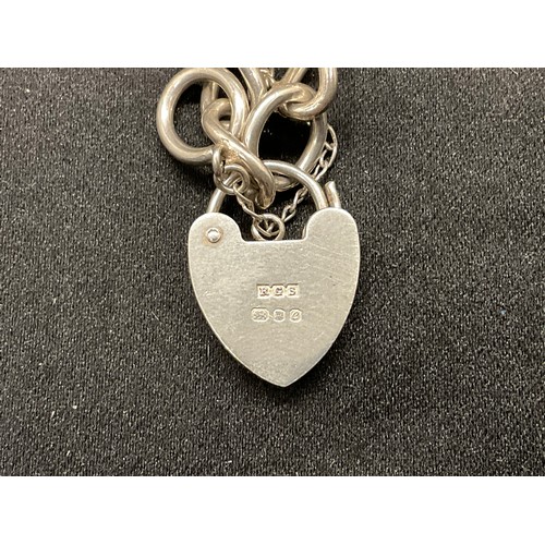 27 - 2 SILVER CHARM BRACELETS (TESTED) WITH A TOTAL OF 26 SILVER & WHITE METAL CHARMS - 2 ADDITIOINAL CHA... 