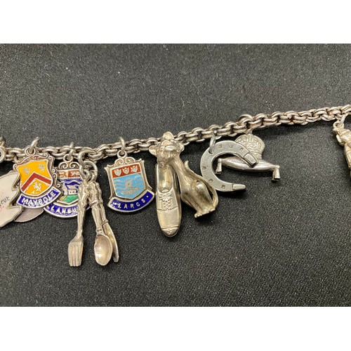 30 - 2 SILVER CHARM BRACELETS (TESTED) WITH A TOTAL OF 33 SILVER & WHITE METAL CHARMS - 1 ADDITIONAL CHAR... 