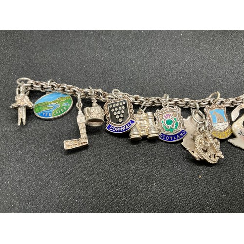30 - 2 SILVER CHARM BRACELETS (TESTED) WITH A TOTAL OF 33 SILVER & WHITE METAL CHARMS - 1 ADDITIONAL CHAR... 
