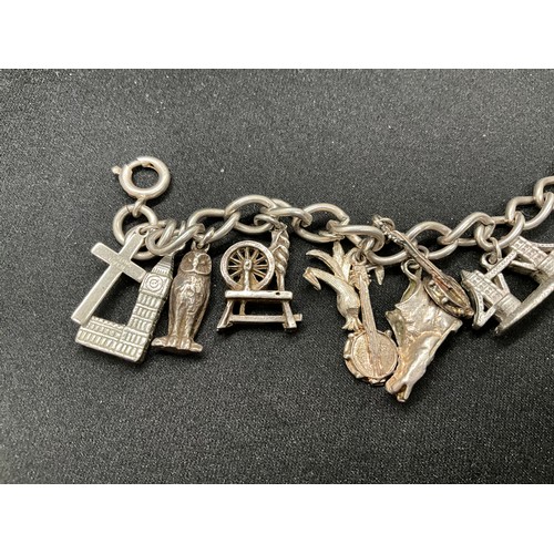 32 - 2 SILVER CHARM BRACELETS (TESTED) WITH A TOTAL OF 23 SILVER & WHITE METAL CHARMS TW71.3G
CLASP ON ON... 