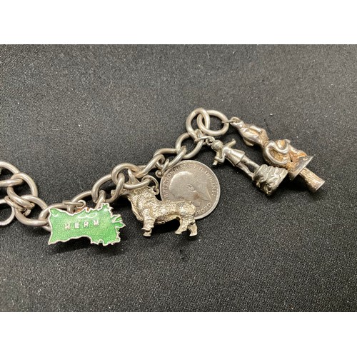 32 - 2 SILVER CHARM BRACELETS (TESTED) WITH A TOTAL OF 23 SILVER & WHITE METAL CHARMS TW71.3G
CLASP ON ON... 