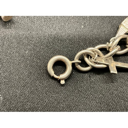 32 - 2 SILVER CHARM BRACELETS (TESTED) WITH A TOTAL OF 23 SILVER & WHITE METAL CHARMS TW71.3G
CLASP ON ON... 