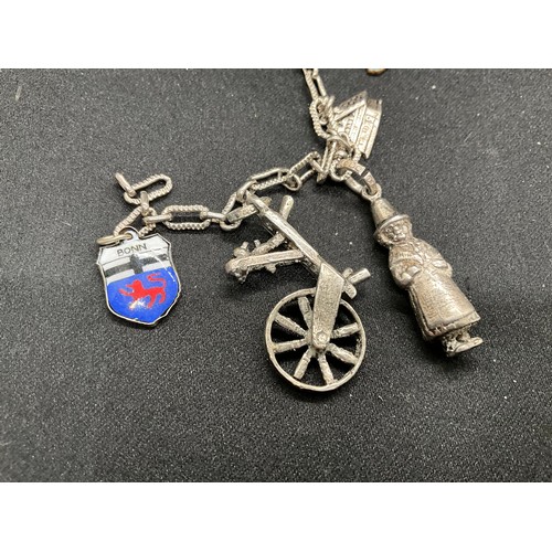 35 - 1 SILVER CHARM BRACELET (TESTED)  AND 1 BRACELET PLATED - WITH A TOTAL OF 19 SILVER CHARMS  WITH 1 A... 