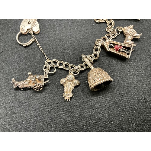 36 - 2 SILVER CHARM BRACELETS (TESTED) WITH A TOTAL OF 26 SILVER & WHITE METAL CHARMS W91.6G
1 BRACELET H... 