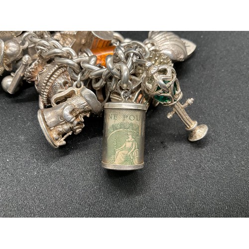 39 - HALLMARKED SILVER CHARM BRACELET WITH 19 SILVER & WHITE METAL CHARMS TW123.2G - ENGLISH HALLMARK SIL... 