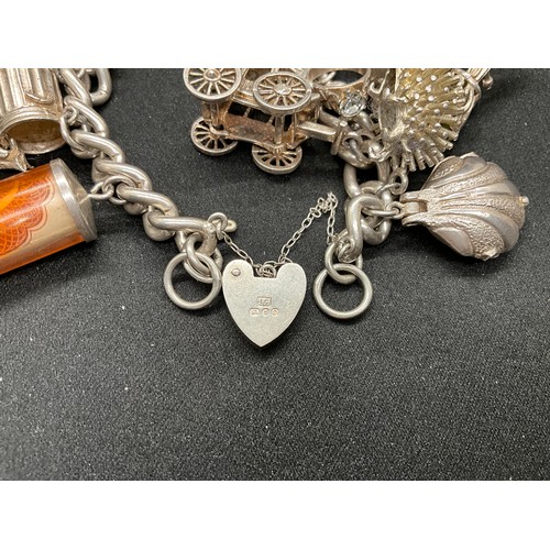 39 - HALLMARKED SILVER CHARM BRACELET WITH 19 SILVER & WHITE METAL CHARMS TW123.2G - ENGLISH HALLMARK SIL... 