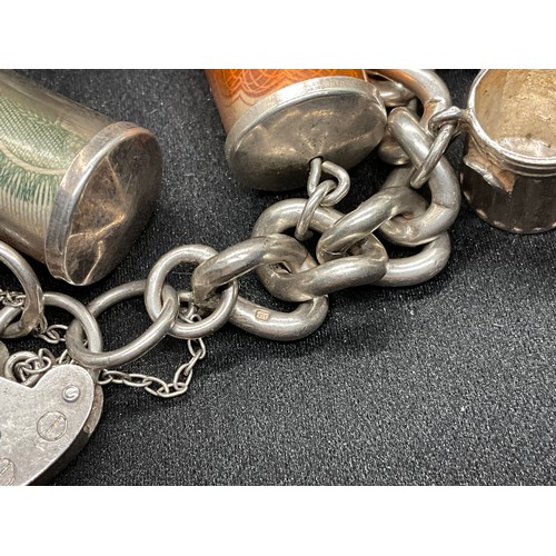 39 - HALLMARKED SILVER CHARM BRACELET WITH 19 SILVER & WHITE METAL CHARMS TW123.2G - ENGLISH HALLMARK SIL... 