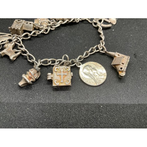 46 - 2 SILVER CHARM BRACELETS (TESTED) WITH A TOTAL OF 20 SILVER CHARMS TW49.1G
1 LOBSTER CLASP ON ONE BR... 