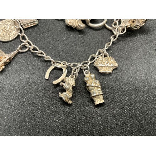 46 - 2 SILVER CHARM BRACELETS (TESTED) WITH A TOTAL OF 20 SILVER CHARMS TW49.1G
1 LOBSTER CLASP ON ONE BR... 
