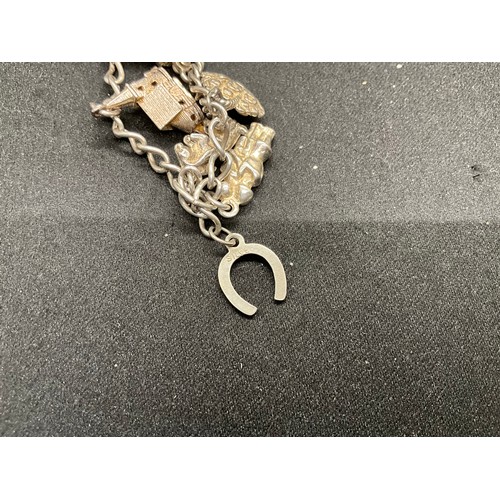 46 - 2 SILVER CHARM BRACELETS (TESTED) WITH A TOTAL OF 20 SILVER CHARMS TW49.1G
1 LOBSTER CLASP ON ONE BR... 