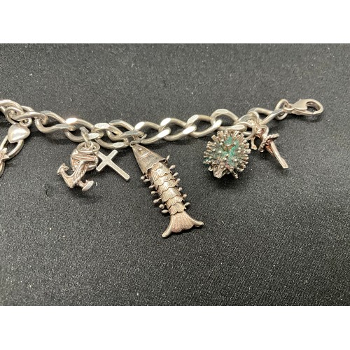 46 - 2 SILVER CHARM BRACELETS (TESTED) WITH A TOTAL OF 20 SILVER CHARMS TW49.1G
1 LOBSTER CLASP ON ONE BR... 