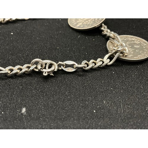 47 - 2 STERLING SILVER CHARM BRACELETS WITH 17 SILVER CHARMS W36.1G
CLASP ON ONE BRACELET IS PLATED, LOCK... 