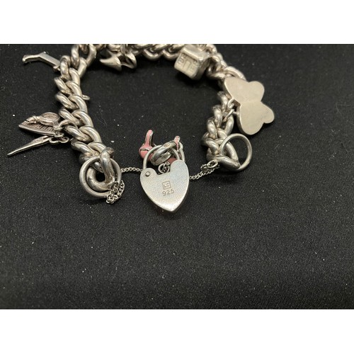 48 - 2 SILVER CHARM BRACELETS (TESTED) WITH A TOTAL OF 22 SILVER & WHITE METAL CHARMS TW106.2G - 1 LOCKET... 