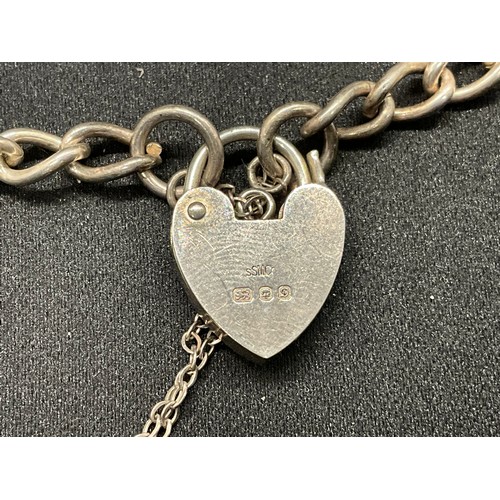 49 - 2 SILVER CHARM BRACELETS (TESTED) WITH A TOTAL OF 25 SILVER & WHITE METAL CHARMS TW69.6G - 1 LOCKET ... 