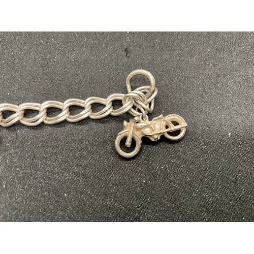 52 - 2 SILVER CHARM BRACELETS (TESTED) WITH A TOTAL OF 20 SILVER & WHITE METAL CHARMS W38.4G - BOTH LOCKE... 
