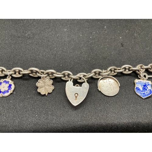 54 - 2 SILVER CHARM BRACELETS (TESTED) WITH A TOTAL OF 20 SILVER & WHITE METAL CHARMS TW60.6G - 1 HOOP HO... 