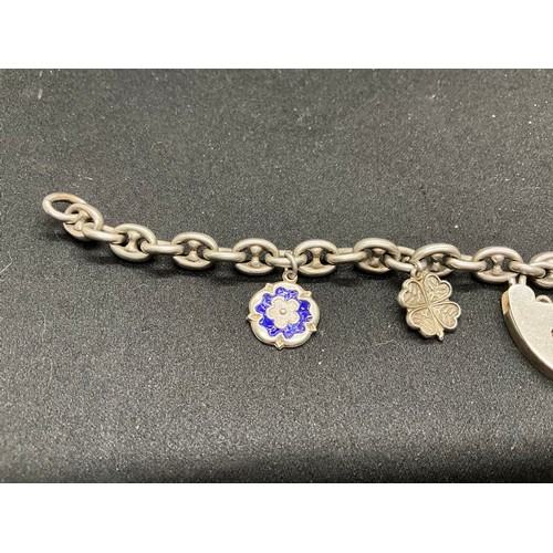 54 - 2 SILVER CHARM BRACELETS (TESTED) WITH A TOTAL OF 20 SILVER & WHITE METAL CHARMS TW60.6G - 1 HOOP HO... 