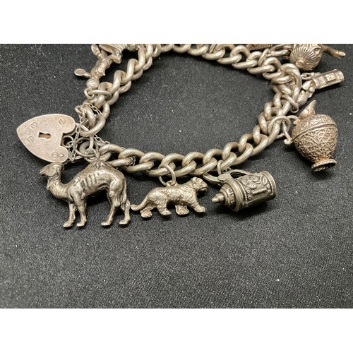 56 - HALLMARKED SILVER CHARM BRACELET WITH 12 SILVER & WHITE METAL CHARMS TW70G - ENGLISH HALLMARK SILVER... 
