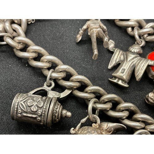 56 - HALLMARKED SILVER CHARM BRACELET WITH 12 SILVER & WHITE METAL CHARMS TW70G - ENGLISH HALLMARK SILVER... 