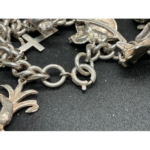 60 - 2 SILVER CHARM BRACELETS (TESTED) WITH A TOTAL OF 30 SILVER & WHITE METAL CHARMS TW93.8G - 1 LOCKET ... 