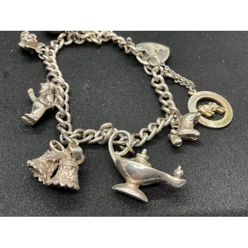 60 - 2 SILVER CHARM BRACELETS (TESTED) WITH A TOTAL OF 30 SILVER & WHITE METAL CHARMS TW93.8G - 1 LOCKET ... 