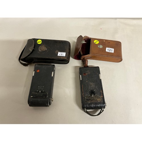 121 - 2 X VINTAGE LEATHER CASED KODAK CAMERAS