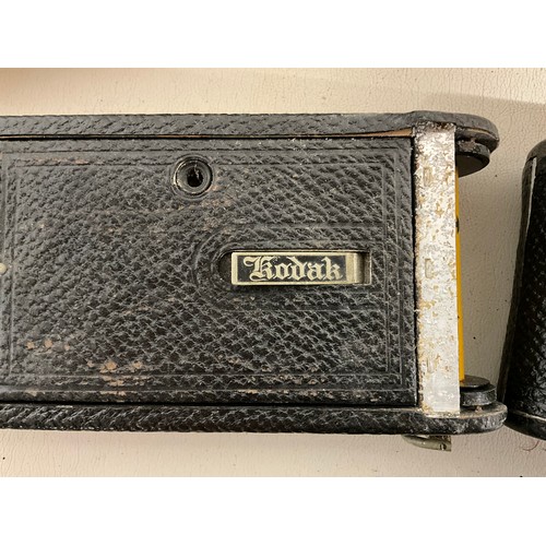 121 - 2 X VINTAGE LEATHER CASED KODAK CAMERAS