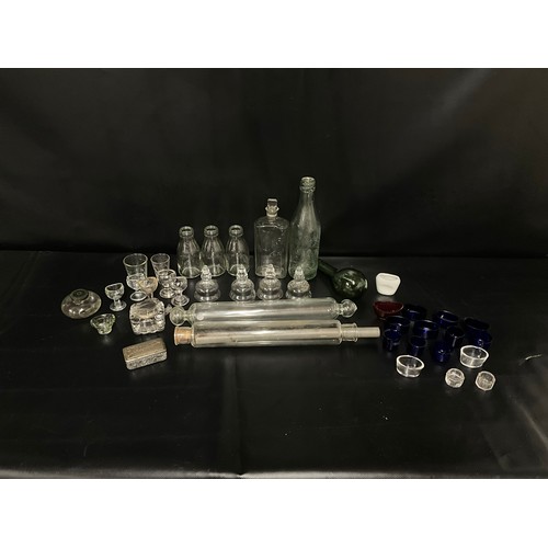 124 - BOX OF VICTORIAN AND LATER GLASSWARE TO INCLUDE INKWELLS, EYE GLASSES, ROLLING PINS,  COLOURED GLASS... 