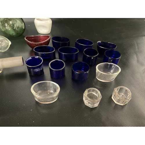 124 - BOX OF VICTORIAN AND LATER GLASSWARE TO INCLUDE INKWELLS, EYE GLASSES, ROLLING PINS,  COLOURED GLASS... 