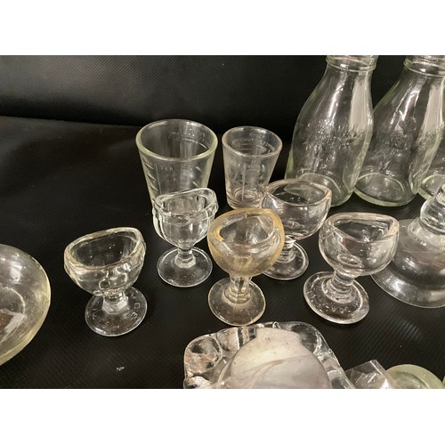 124 - BOX OF VICTORIAN AND LATER GLASSWARE TO INCLUDE INKWELLS, EYE GLASSES, ROLLING PINS,  COLOURED GLASS... 