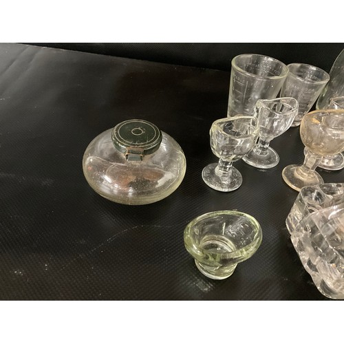 124 - BOX OF VICTORIAN AND LATER GLASSWARE TO INCLUDE INKWELLS, EYE GLASSES, ROLLING PINS,  COLOURED GLASS... 