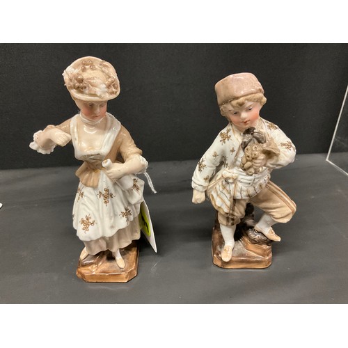 163 - PAIR OF CONTINENTAL LADY & GENT FIGURES A/F WITH CROSSED SWORDS TO BASE POSSIBLY DRESDEN H10