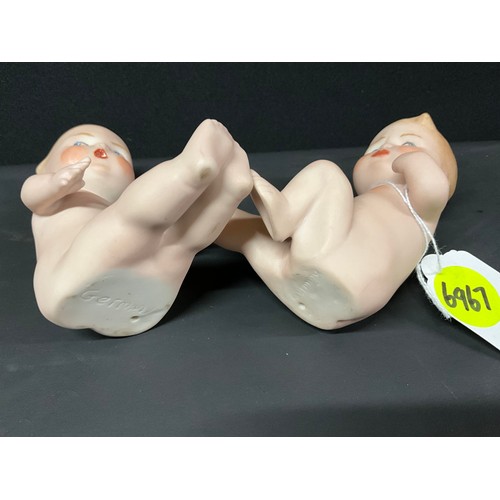 174 - PAIR OF GERMAN BISQUE PIANO BABIES