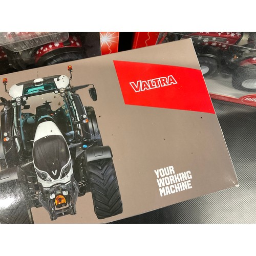57 - 3 VALTRA MODEL TRACTORS IN BOXES