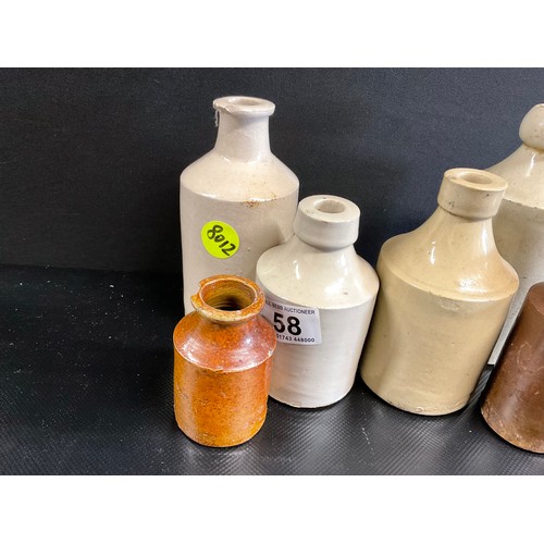 58 - 6 VICTORIAN EARTENWARE BOTTLES A/F