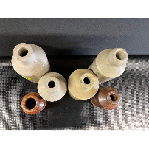 58 - 6 VICTORIAN EARTENWARE BOTTLES A/F