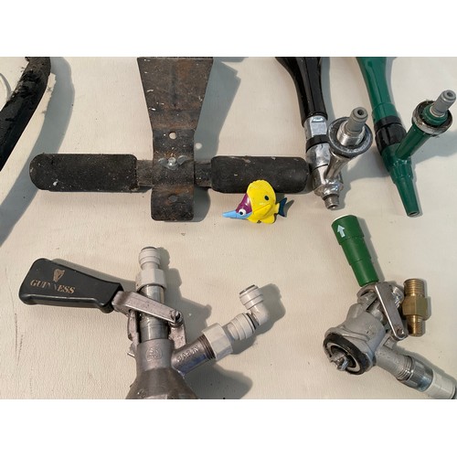 55 - CRATE OF BEER PUMPS GUINESS ETC