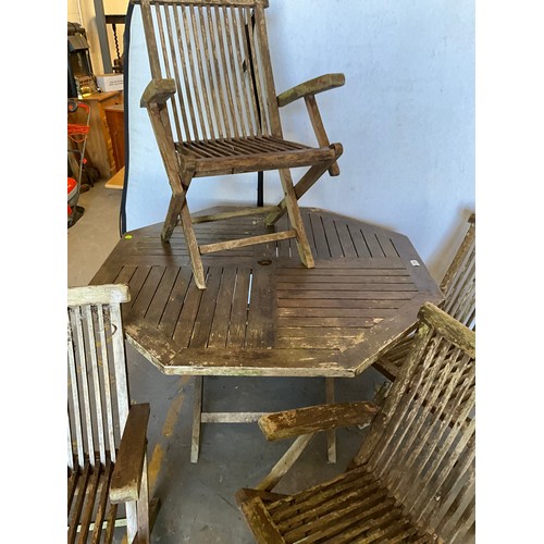 338 - TEAK OCTAGNOL GARDEN TABLE WITH 4 MATCHING CHAIRS A/F H30