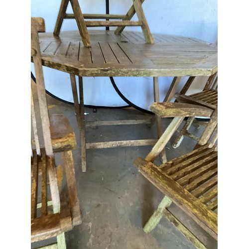 338 - TEAK OCTAGNOL GARDEN TABLE WITH 4 MATCHING CHAIRS A/F H30