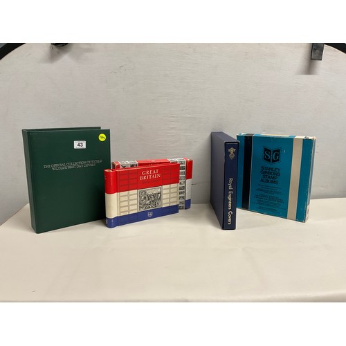 43 - THE OFFICIAL COLLECTION OF WORLD WILDLIFE FIRST DAY COVERS ALONG WITH THREE BOXED STAMP ALBUMS AND C... 