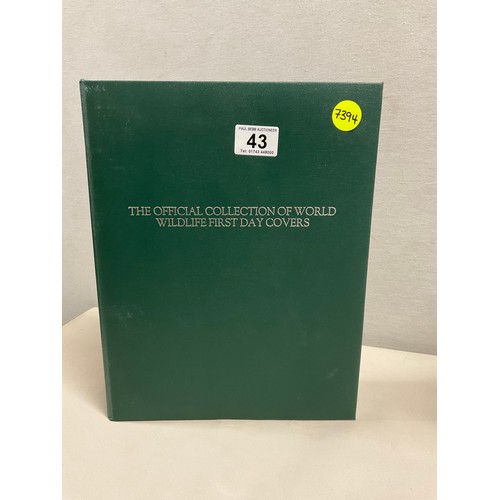43 - THE OFFICIAL COLLECTION OF WORLD WILDLIFE FIRST DAY COVERS ALONG WITH THREE BOXED STAMP ALBUMS AND C... 