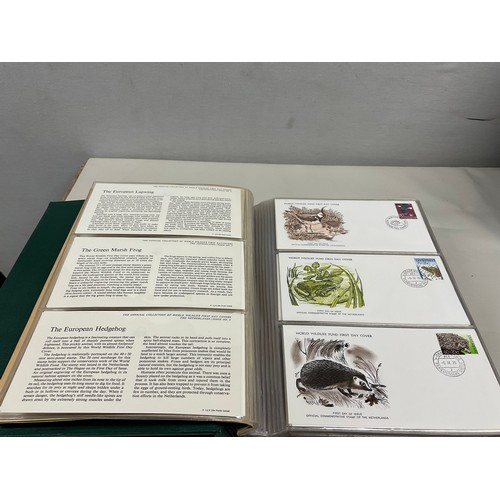 43 - THE OFFICIAL COLLECTION OF WORLD WILDLIFE FIRST DAY COVERS ALONG WITH THREE BOXED STAMP ALBUMS AND C... 