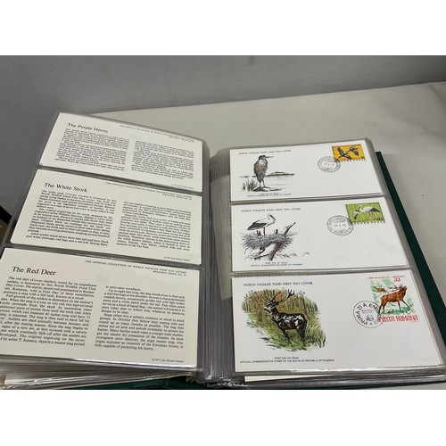 43 - THE OFFICIAL COLLECTION OF WORLD WILDLIFE FIRST DAY COVERS ALONG WITH THREE BOXED STAMP ALBUMS AND C... 