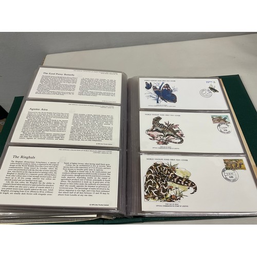 43 - THE OFFICIAL COLLECTION OF WORLD WILDLIFE FIRST DAY COVERS ALONG WITH THREE BOXED STAMP ALBUMS AND C... 