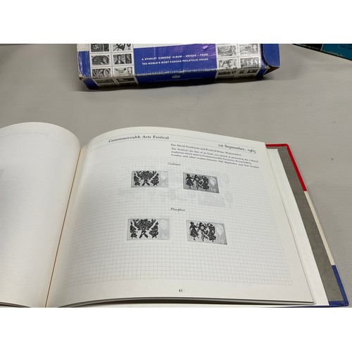43 - THE OFFICIAL COLLECTION OF WORLD WILDLIFE FIRST DAY COVERS ALONG WITH THREE BOXED STAMP ALBUMS AND C... 