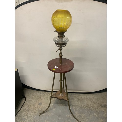 51 - VICTORIAN STANDARD OIL LAMP ON BRASS TRIPOD BASE CAST IRON STRETCHER AND RED GRANITE CENTRE - LAMP B... 
