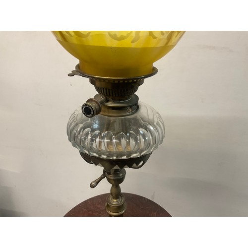 51 - VICTORIAN STANDARD OIL LAMP ON BRASS TRIPOD BASE CAST IRON STRETCHER AND RED GRANITE CENTRE - LAMP B... 