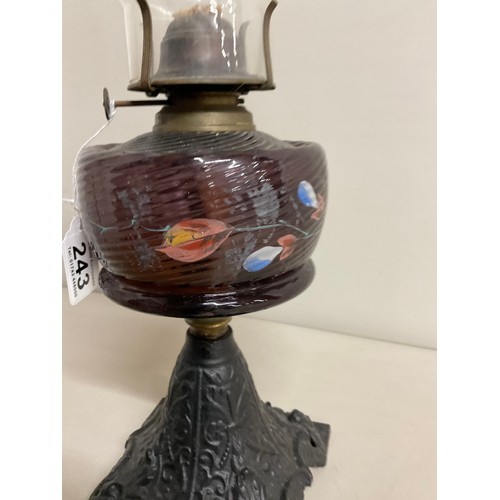 2 - VICTORIAN OIL LAMP ON CAST IRON BASE WITH COLOURED GLASS BOWL PAINTED LEAVES COMPLETE WITH CHIMNEY -... 